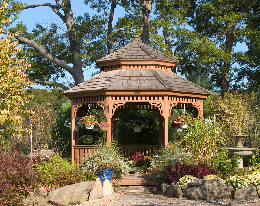 wood gazebo in garden setting, surrounded by impressive landscaping, hardscaping elements - O'Fallon, IL